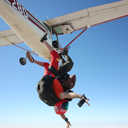 Tandem Skydiver exiting the airplane near Austin TX